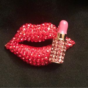 Smooches with pink lip gloss broach